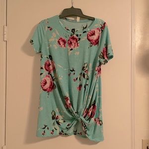 Size small shirt never worn just sitting in my closet.